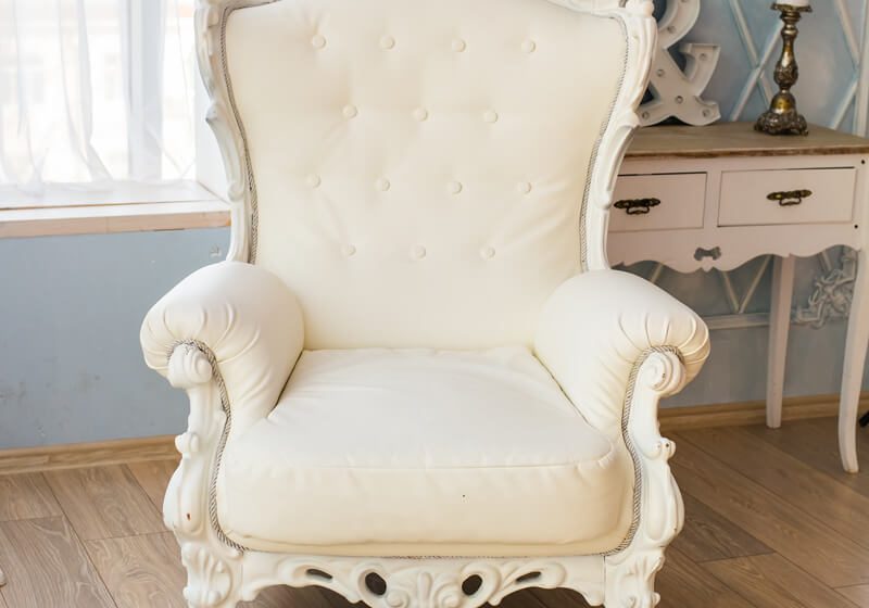luxury-armchair-in-a-plain-white-interior-P8NRM3J.jpg